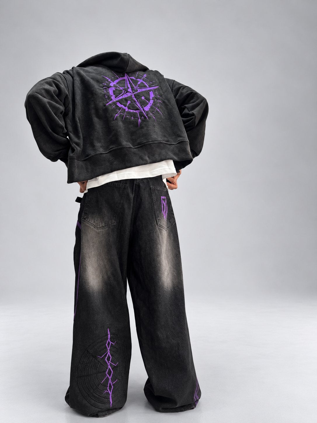 Drop 001 hoodie compass print and jeans, back view
