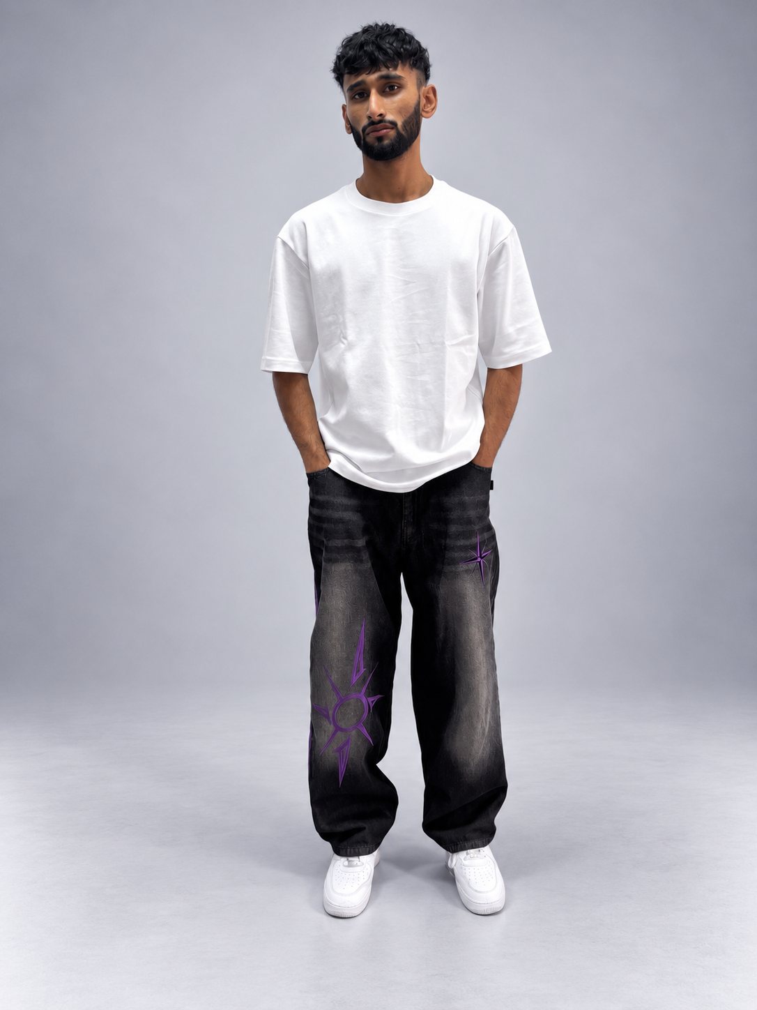 Drop 001 jeans with purple embroidery