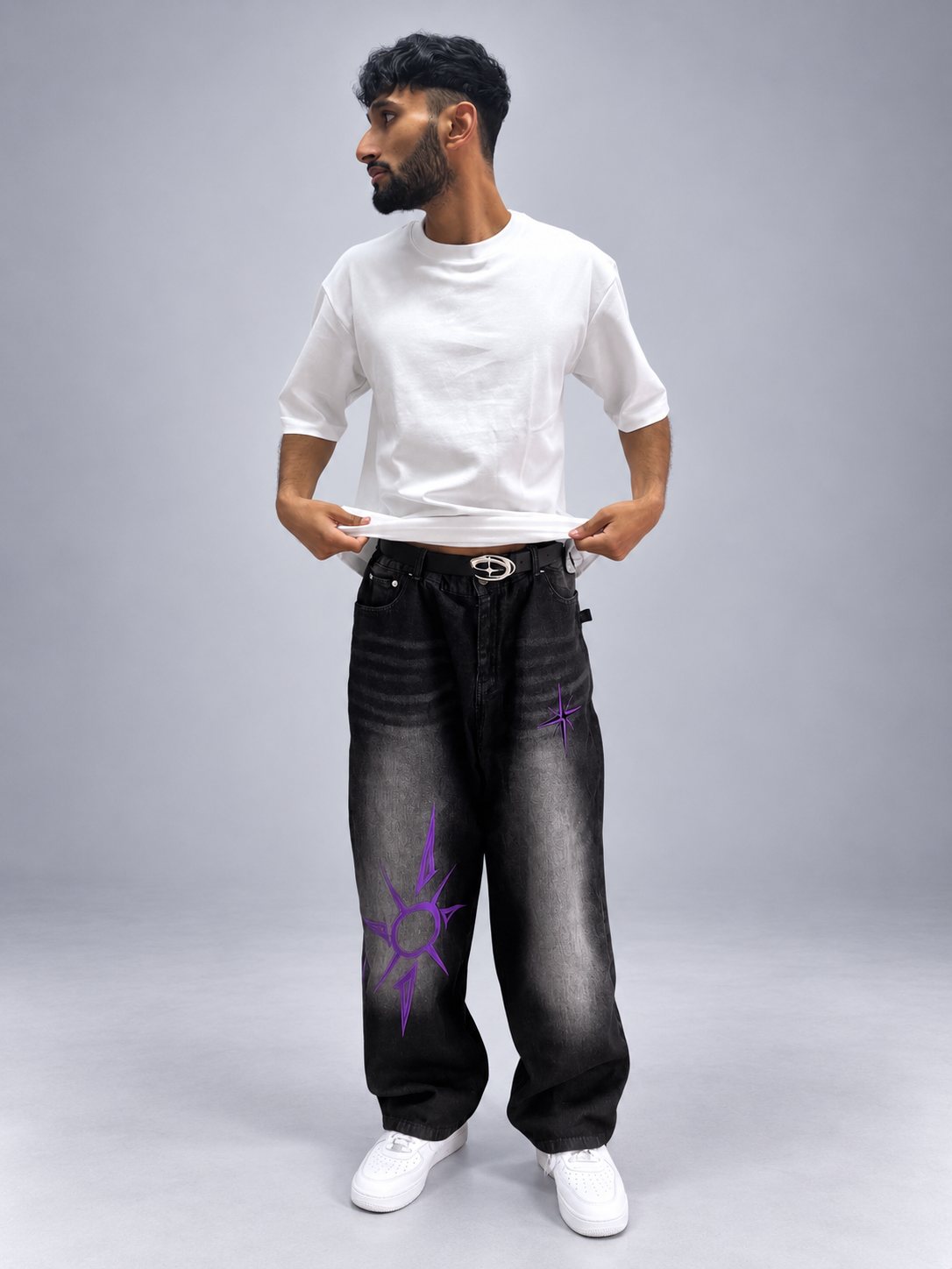 Model in a white tee and Drop 001 jeans